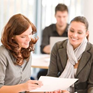 Agent showing paperwork to client