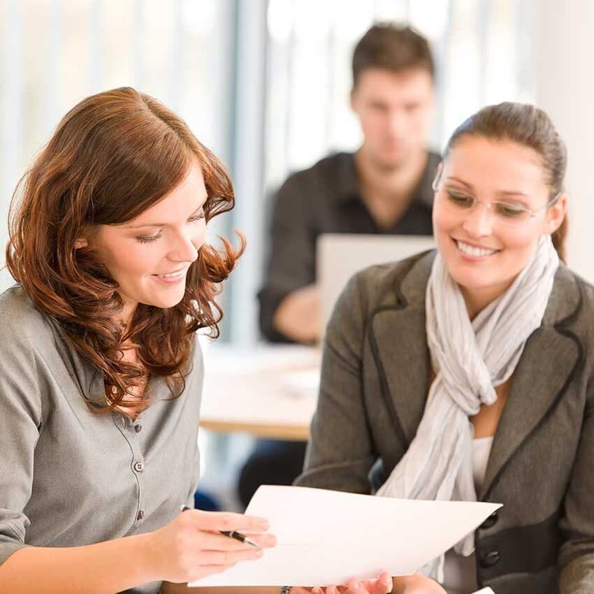 Agent showing paperwork to client